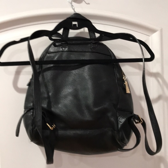 Michael Kors backpac with multiple pockets. Outside has some stains as pictured - Picture 6 of 15